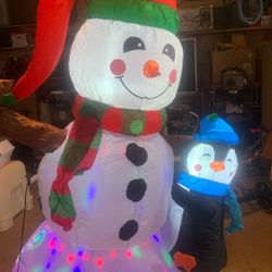 snow man inflable con pinguinos 
