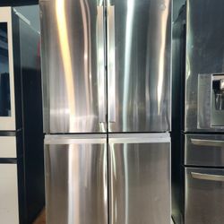 GE Profile 28.3 Cu. Ft. Quad-Door Refrigerator with Dual-Dispense AutoFill Pitcher in Fingerprint Resistant Stainless.