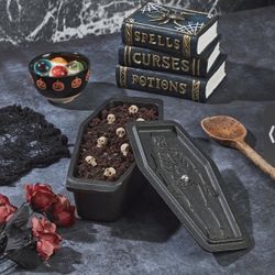 SMITH CLARK COFFIN WITH SKELETON CAST IRON LOAF 