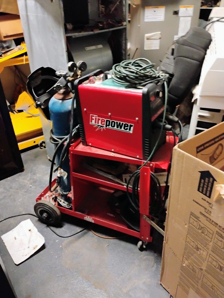 Red Welder And Cart