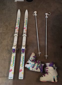 Vintage: Snow skis, boots, and poles