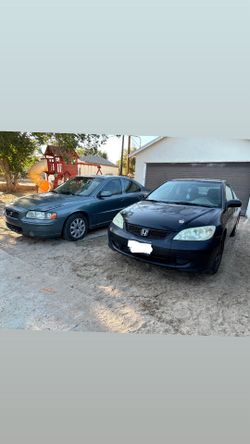 Cars 2004 Honda Civic ex and 2005 Volvo S60 2.5T