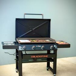 Brand new Blackstone 36" Culinary Omnivore Griddle with Hood 4 -Burner Liquid propane Flat Top Grill
