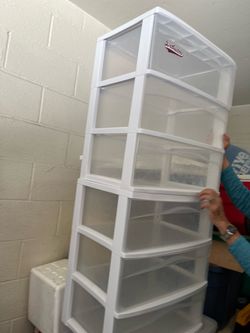 2 plastic storage bins