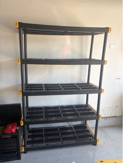 AC, storage shelves, weed whacker