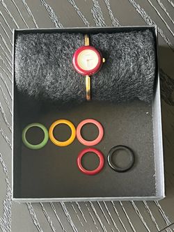 Gucci Bangle Watch with Interchangeable Bezels