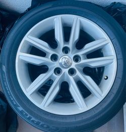4 Stock Toyota Rims and tires