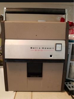Vintage Bell and how 500 Explorer automatic 754 slide projector