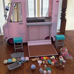 Our Generation Sweet Stop Ice Cream Truck - Pink. Plays Music, Lights up. Missing a lot of accessories. Has scratches & chalk won’t come off chalkboar