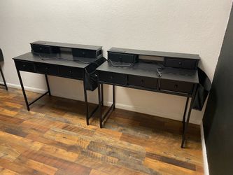 Desks with plugs