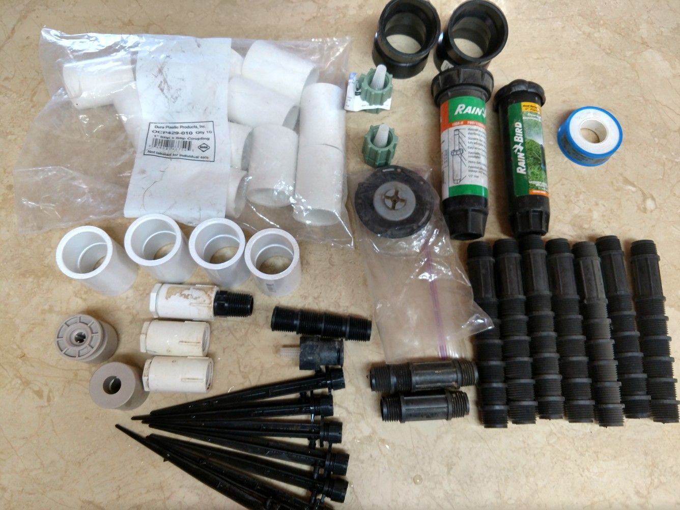 Batch of sprinkler repair parts