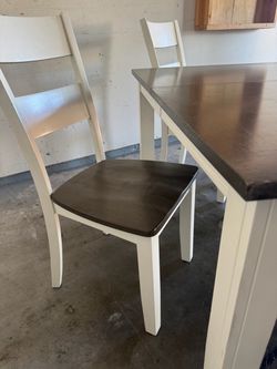 Dining room table and chairs set