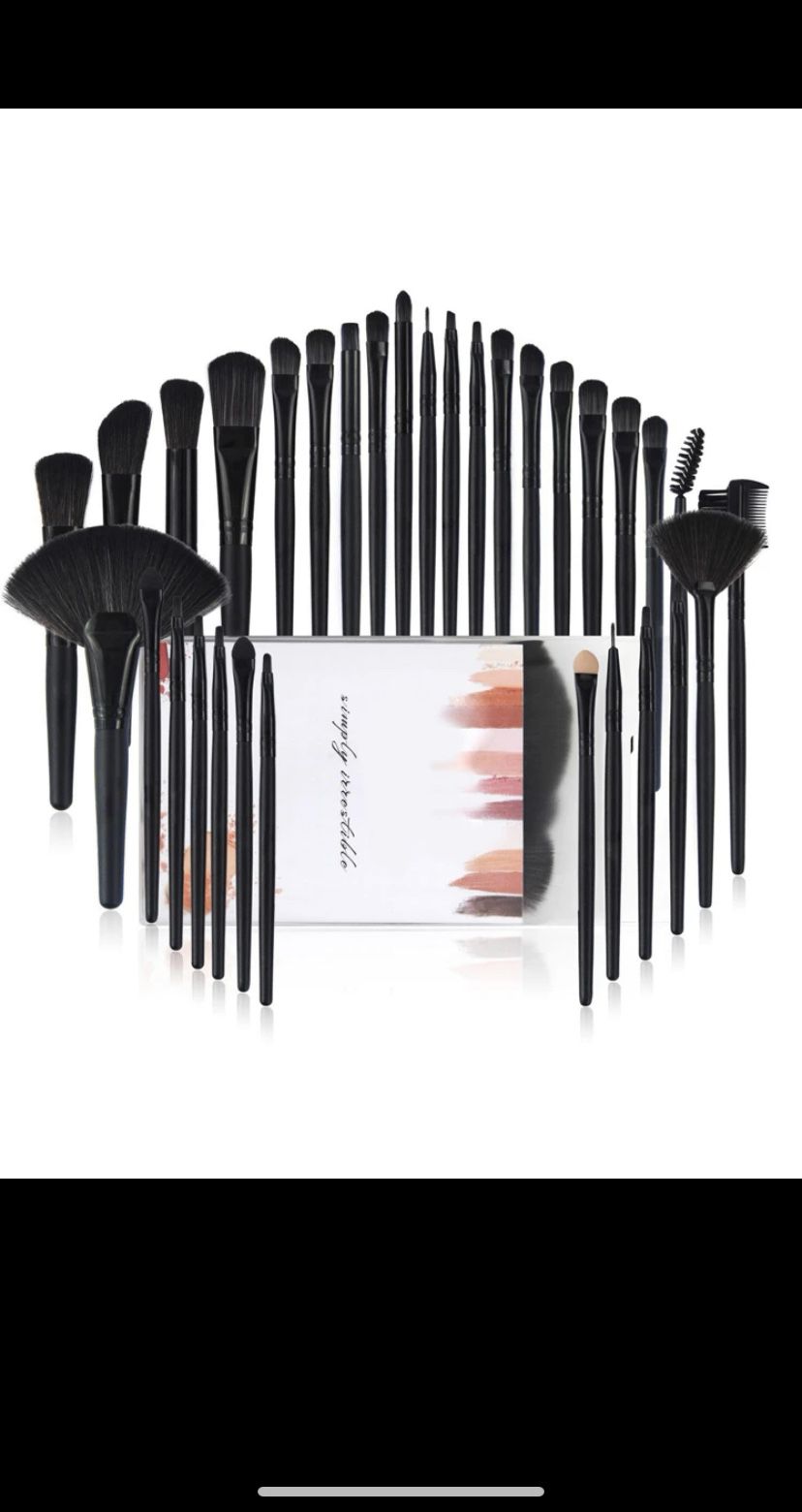 A set of 32 Piece black makeup Brushes,makeup blush, concealer, gloss and lip brush 