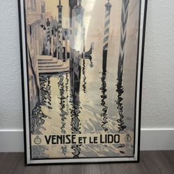 Decorative framed poster featuring Venise et le Lido design. Framed poster 24in x 36in 