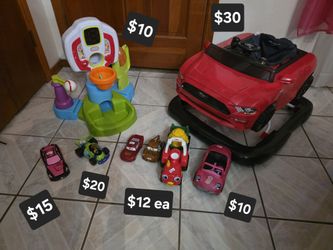 Baby toys: activity center $10, lightning mcqueen $12, mater $12, hello kitty $15, barbie $10, toy story woody $20,(mustang Sold), tow pull tracker