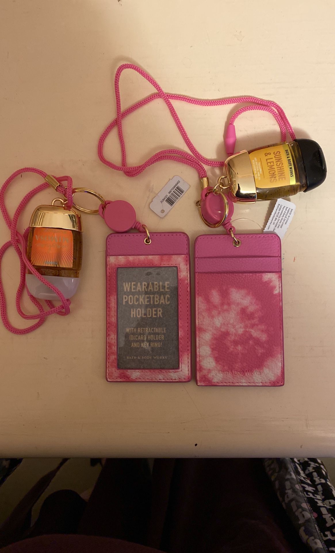 Bath Body Works Wearable Pocketpac Holder with Retractable I’d Holder And Key Ring Neck Bands With Hand Sanitizer $7 Each More Available C My Page Ty