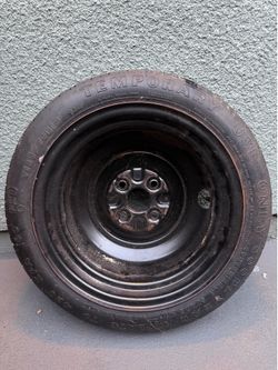 OEM Compact Spare Tire (Donut) with 4-Lug Steel Rim – T125/70D14