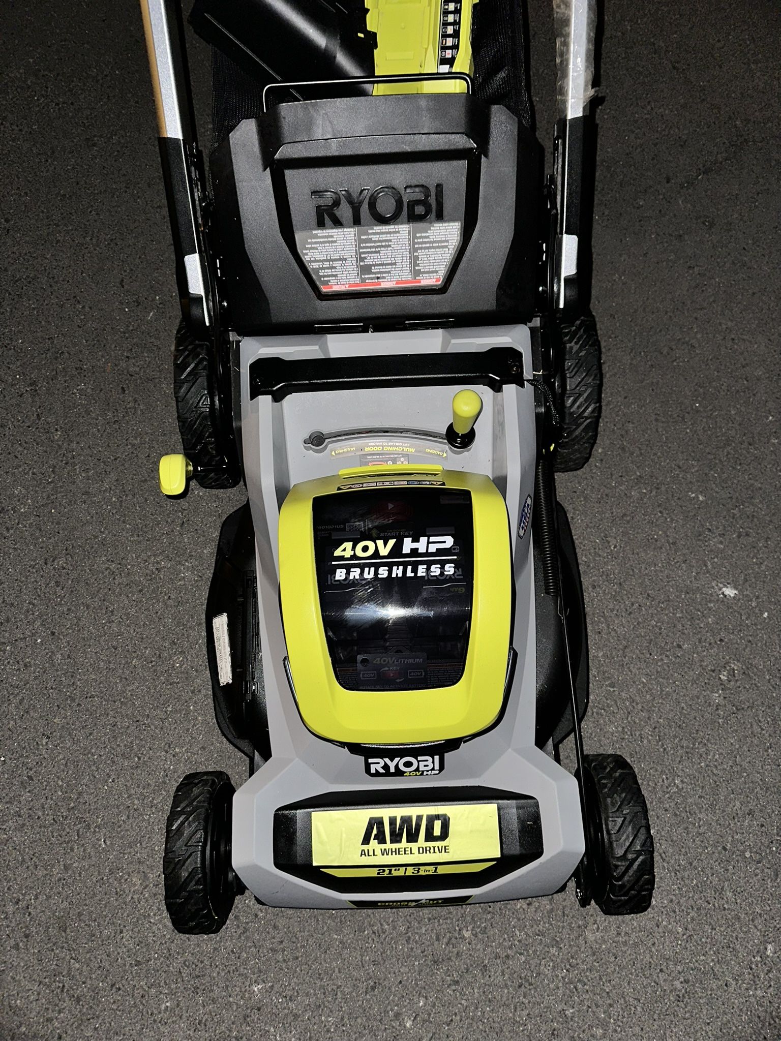 Lawnmower Ryobi all wheel drive croos cut costumer return to Home Depot 2 battery