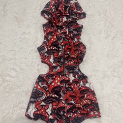 New red and black mushroom print romper with a hood. Stretchy fabric with cut outs. Zipper front with cute mushroom zipper pull  This brand tends to r