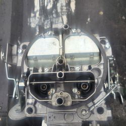 New four barrel, carburetor.