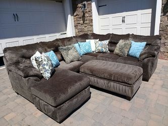 Brown U Shaped Sectional with Storage ottoman