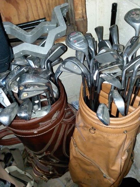 2 sets of golf club with bags