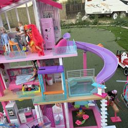 Barbie Dream House.        LOL Doll House