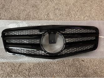 2002 through 2009 Mercedes-Benz front bumper grill for E class models E 200 E220 E350 E 550 also 2013 E 63 AMG model DAMAGED  SEE PICS  $50 bucks