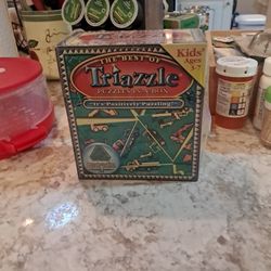 Triazzle  Puzzles In a Box 