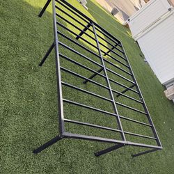 Queen-size metal bed frame, like new.