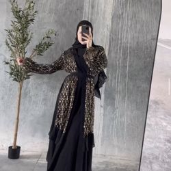 black and gold abaya