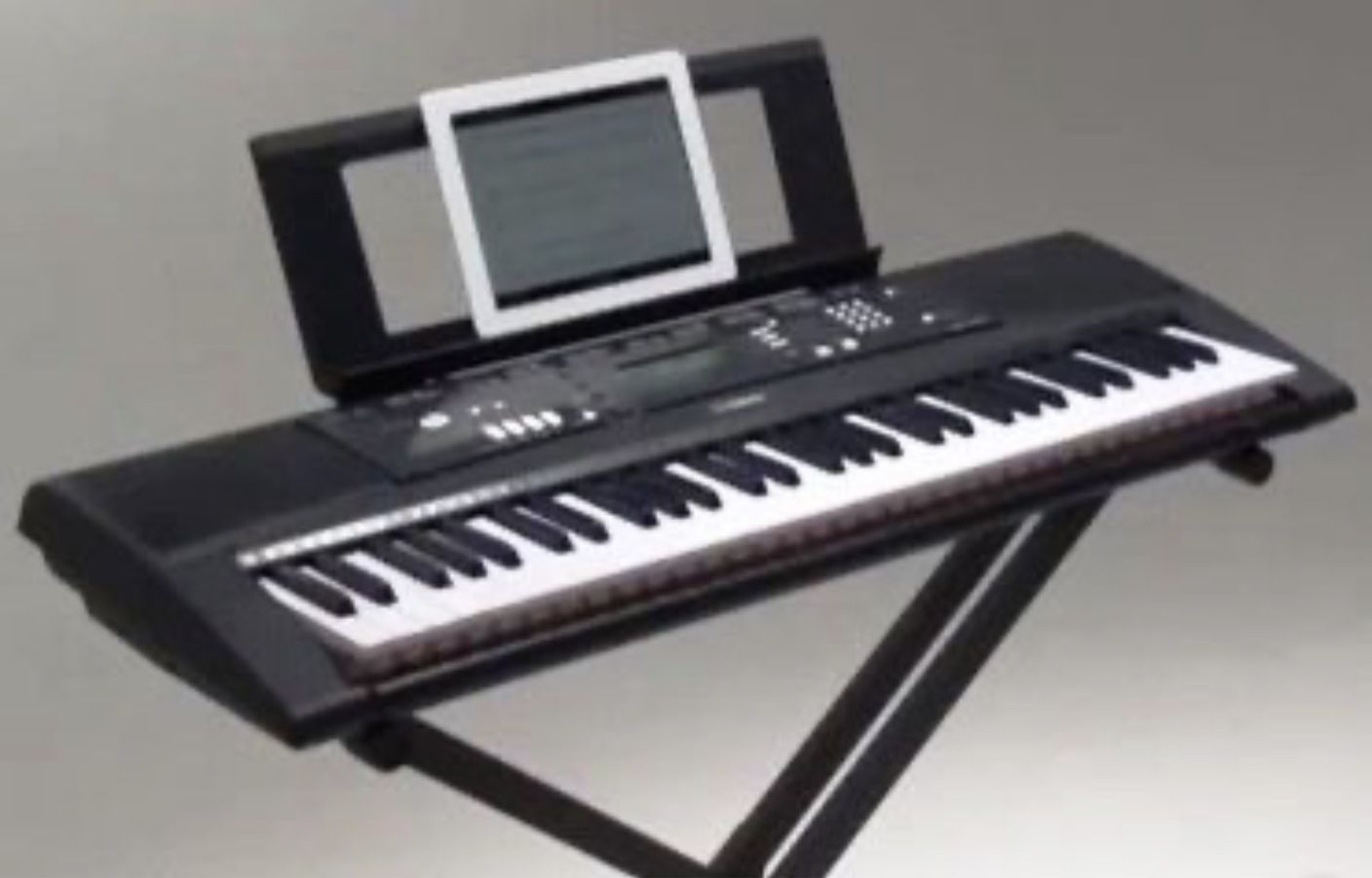 Yamaha EZ-220 61-Note Lighted Portable Keyboard with stand and music