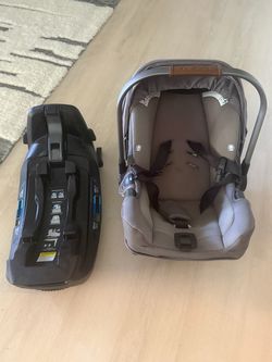 Nuna Pipa infant car seat with base and converter for stroller