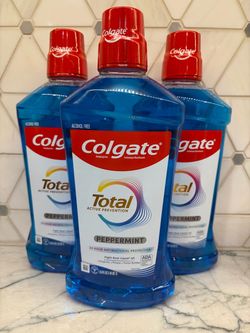 Colgate mouthwash: Alcohol-free Colgate Total Active Prevention mouthwash in peppermint flavor; 33.8 fl oz (1L) bottles. New/sealed bottles.