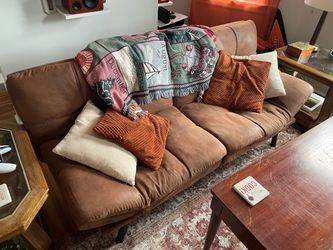 Brown adjustable couch/futon