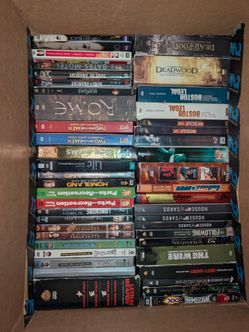Box full of tv shows and tv series on DVD