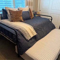 Full size bed with twin pullout trundle