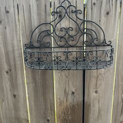 Wrought iron plant holder