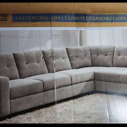 Grey fabric sectional sofa new in a box