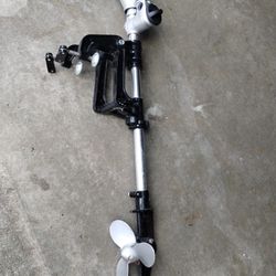 Converts a standard 2-stroke or 4-stroke grass trimmer/brush cutter) into a functional outboard marine motor.