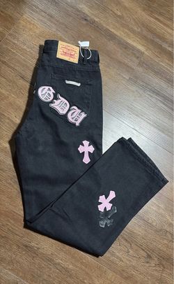 Black and light pink chrome hearts jeans
