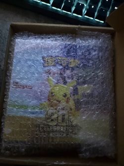 Pokémon TCG 30th Celebration Simplified Chinese Booster Packs – 6 Foil Cards.