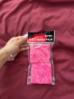 Pink wrist band working out