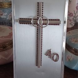 Vintage framed 40th Anniversary Cross w/ruby stones and rings. 