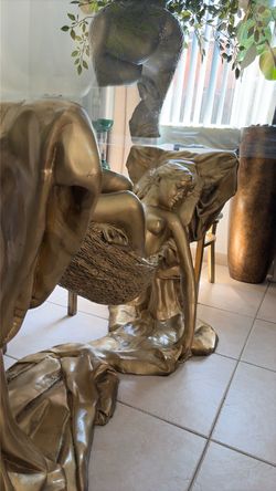 About 500 pounds of pure bronze painted gold for better looks