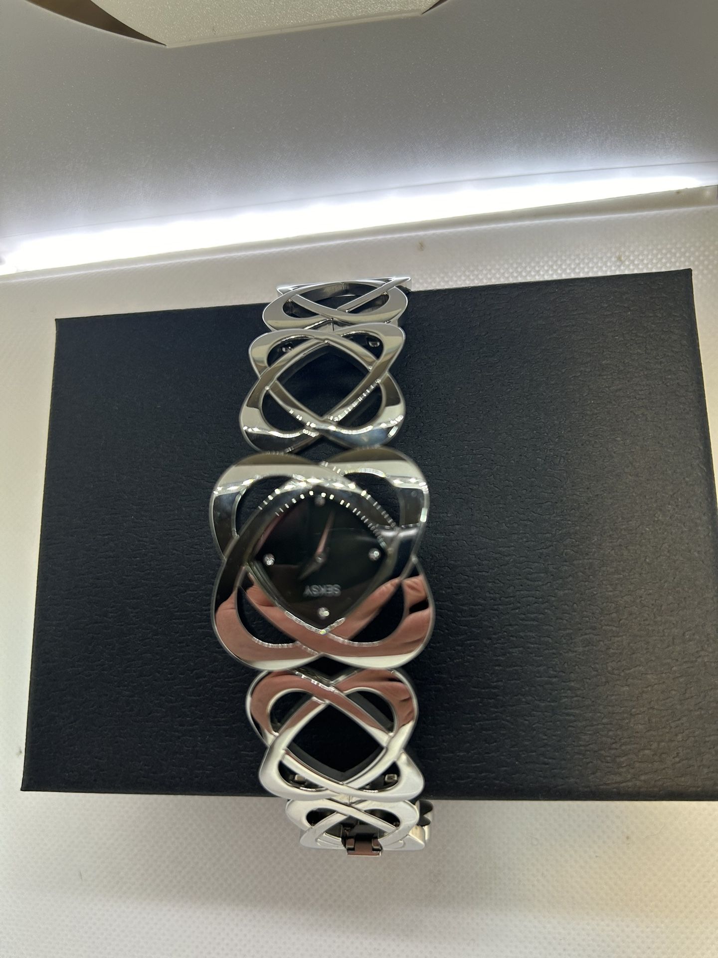 Women's watch brand Seksy .$25.
