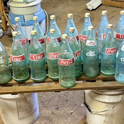 17 Coca-Cola bottles