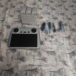 DJI RC control, Batteries(mini 3), Extra Propellers, Screw Driver, and Backpack Strap Mount