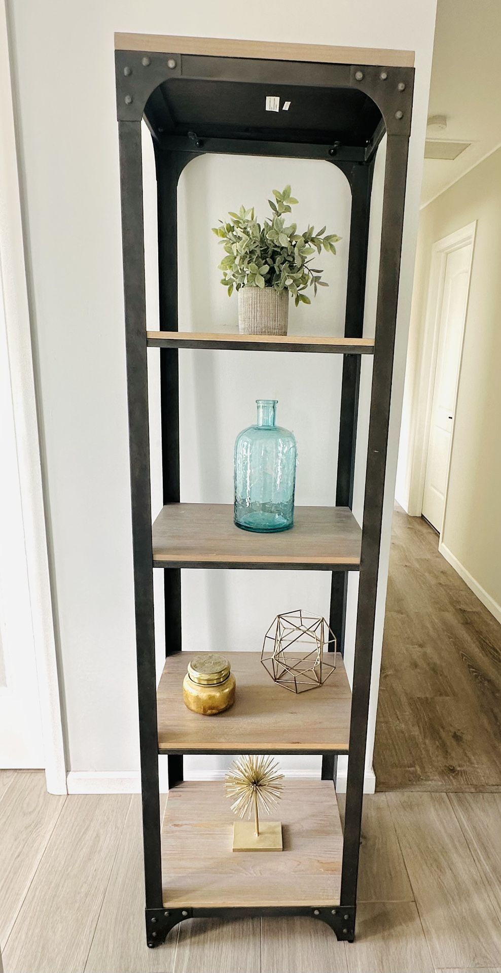 Ladder Shelf with a black metal frame and wood-look shelves, Size H 72 inch/ L19/D15 $80