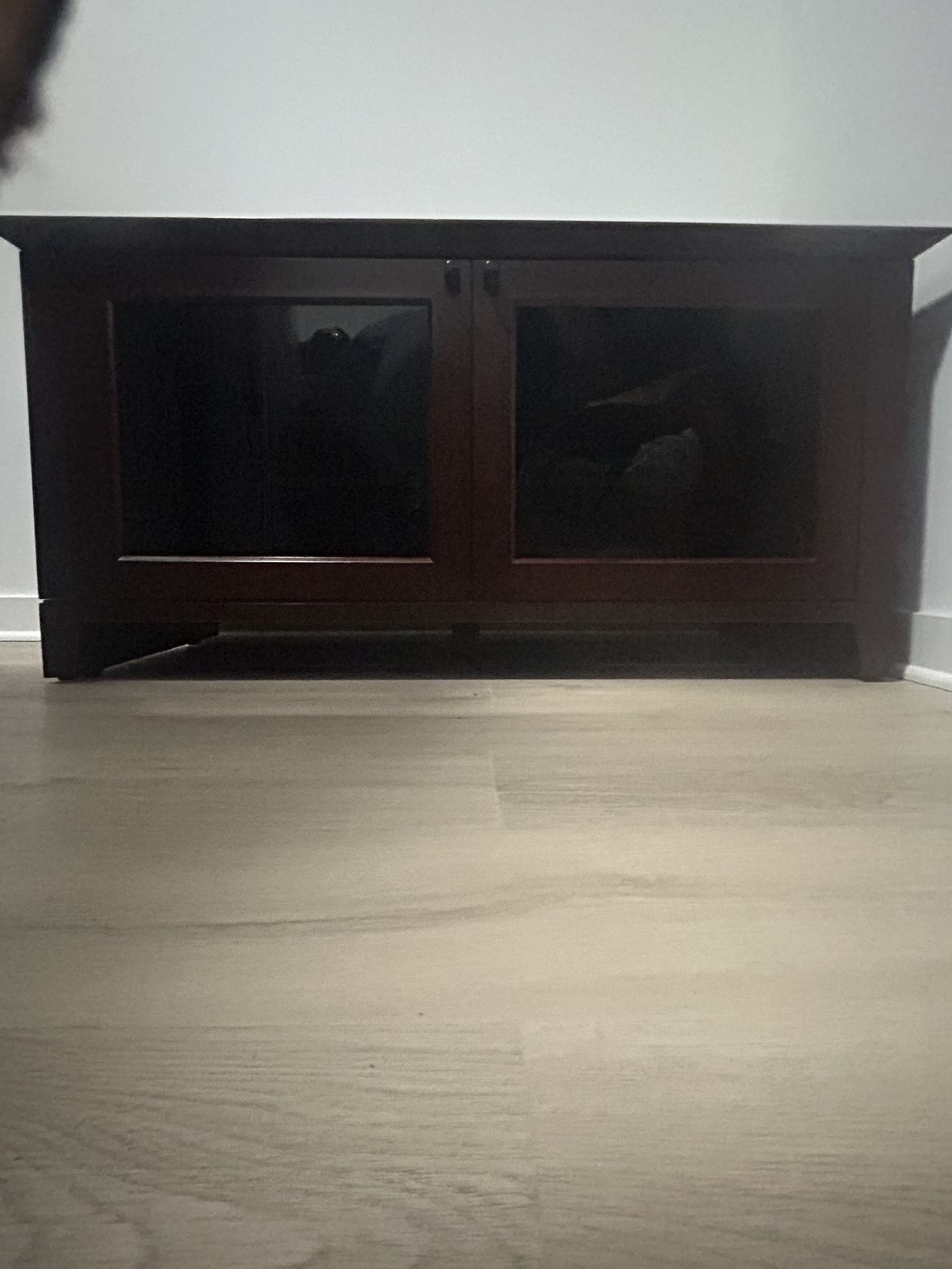 Mahogany Brown Entertainment TV Stand Or Storage Cabinet Swivel Wheels Can Hold A Large Tv Up To 60 Inches Or More Smoke Glass Top & Door From Raymor